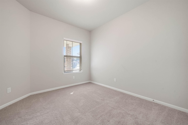 511 Emerald Thicket Ln, Huffman, TX 77336 - carpeted spare room with baseboards
