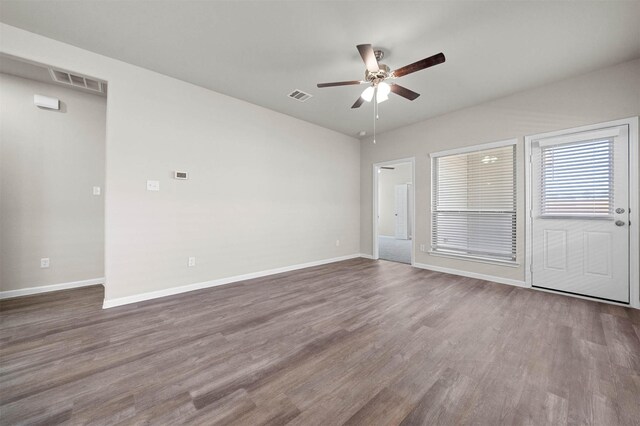 511 Emerald Thicket Ln, Huffman, TX 77336 - empty room featuring ceiling fan, wood finished floors, and baseboards