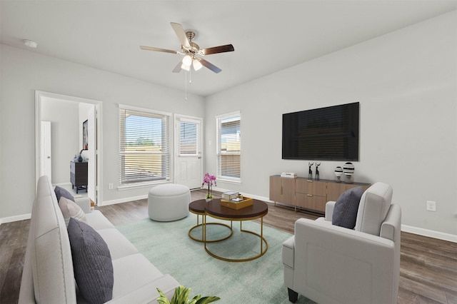 511 Emerald Thicket Ln, Huffman, TX 77336 - living area featuring a ceiling fan, baseboards, and wood finished floors