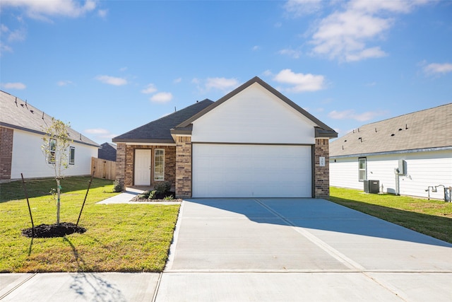 ranch-style house with a garage, a front lawn, and central AC