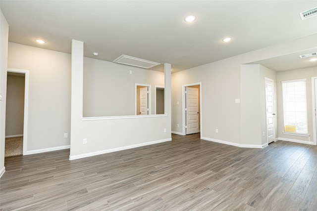 empty room featuring hardwood / wood-style flooring