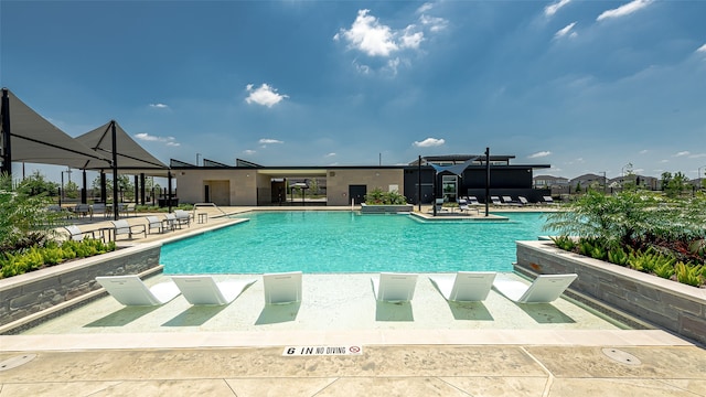 view of pool with a patio