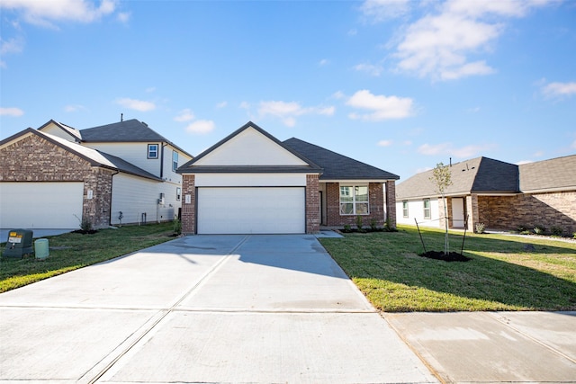 view of front of house featuring a front lawn and a garage