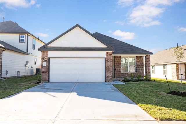 view of front facade featuring a front lawn, central AC unit, and a garage