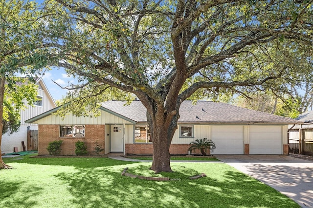 ranch-style house featuring a garage and a front lawn