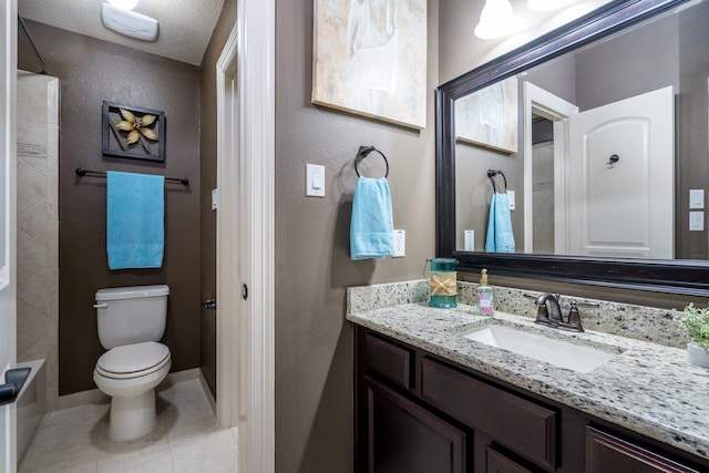 full bathroom with a textured ceiling, shower / bathing tub combination, tile patterned floors, vanity, and toilet