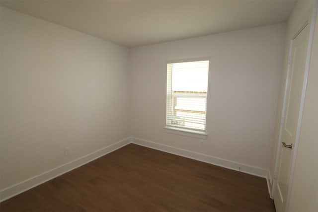 9819 Robard Ridge Ct, Montgomery, TX 77316 - unfurnished room featuring dark wood-style flooring and baseboards