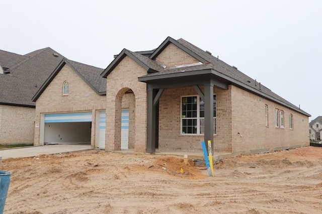 view of front of home with a garage