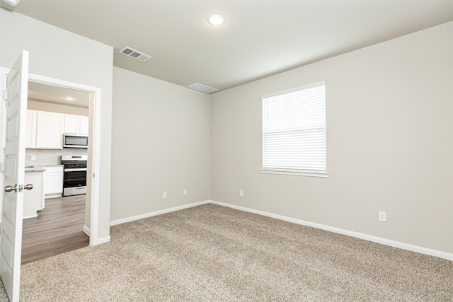 view of carpeted empty room