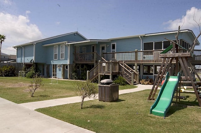 view of play area featuring a lawn