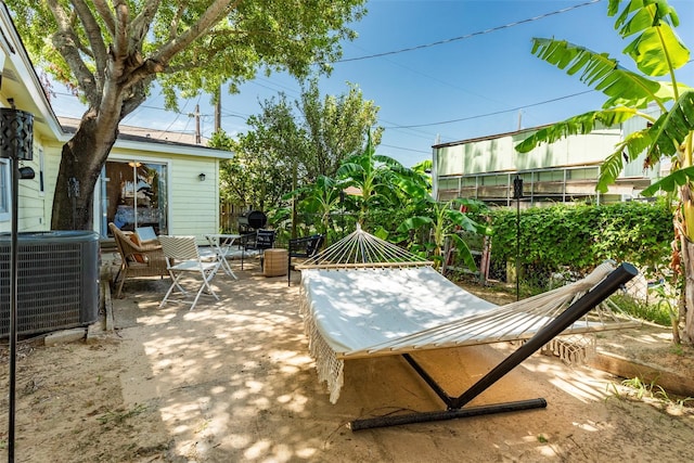 view of patio with central AC