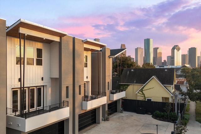 outdoor building at dusk with a garage