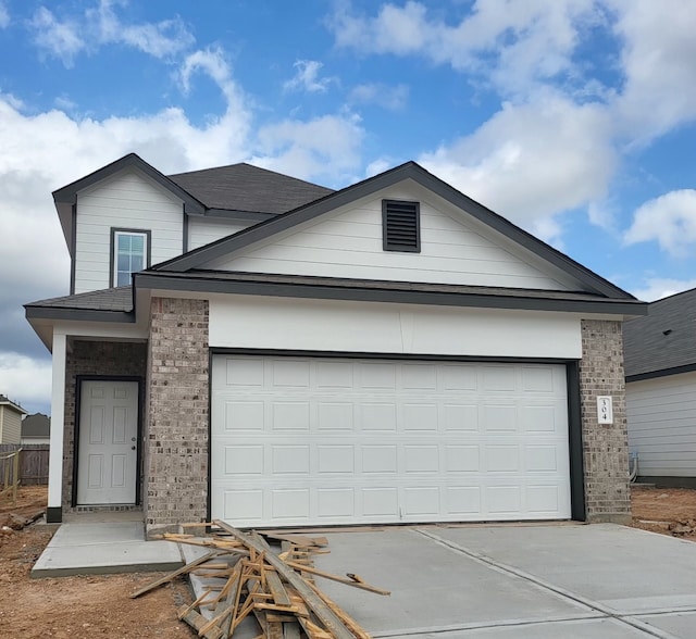 view of front of property with a garage