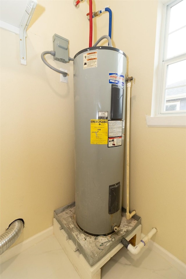 utility room with water heater