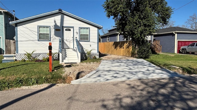 view of front facade with a front lawn