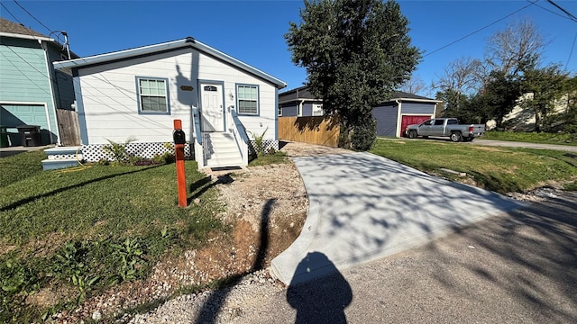 view of front of property with a front lawn