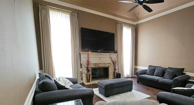 living room featuring ceiling fan, vaulted ceiling, plenty of natural light, and hardwood / wood-style flooring