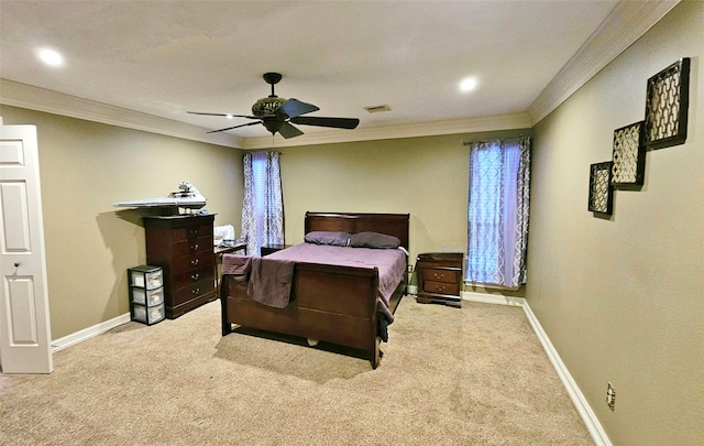 carpeted bedroom with recessed lighting, crown molding, a ceiling fan, visible vents, and baseboards