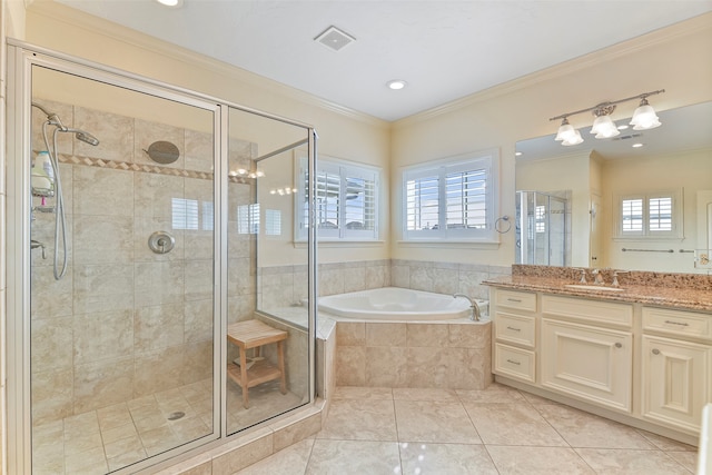 bathroom with ornamental molding, vanity, and independent shower and bath