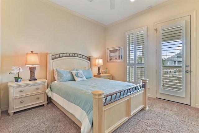 carpeted bedroom with ceiling fan and crown molding