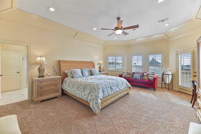 carpeted bedroom featuring ceiling fan and crown molding