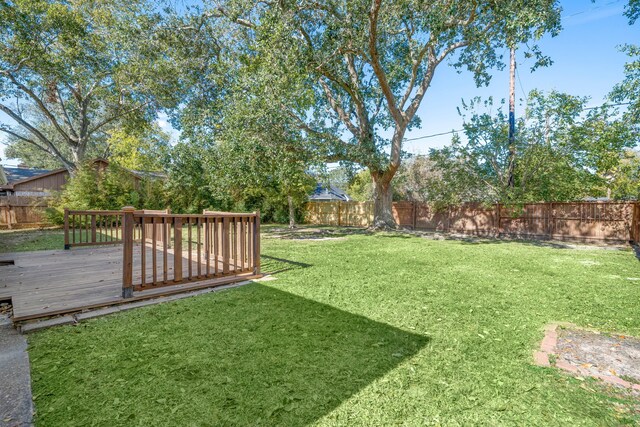 view of yard featuring a deck