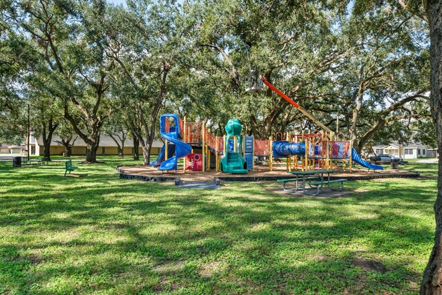 view of playground featuring a lawn