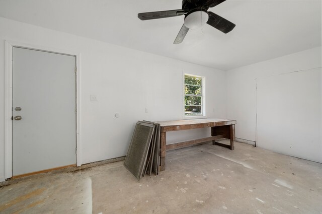 interior space featuring ceiling fan