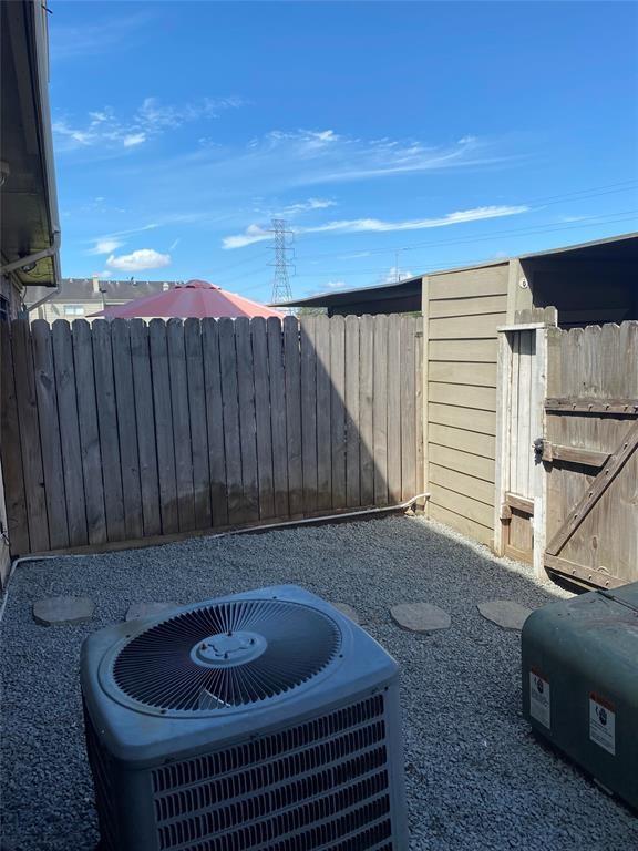 view of yard featuring central air condition unit