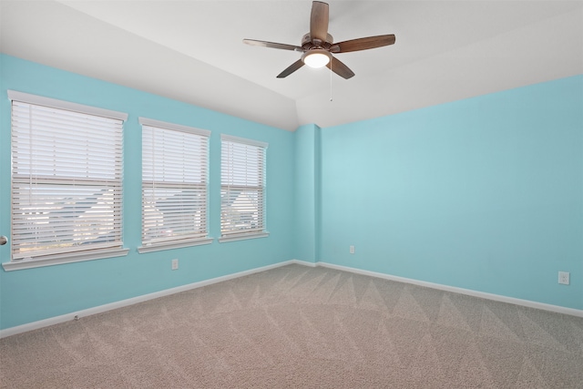 unfurnished room with carpet and ceiling fan