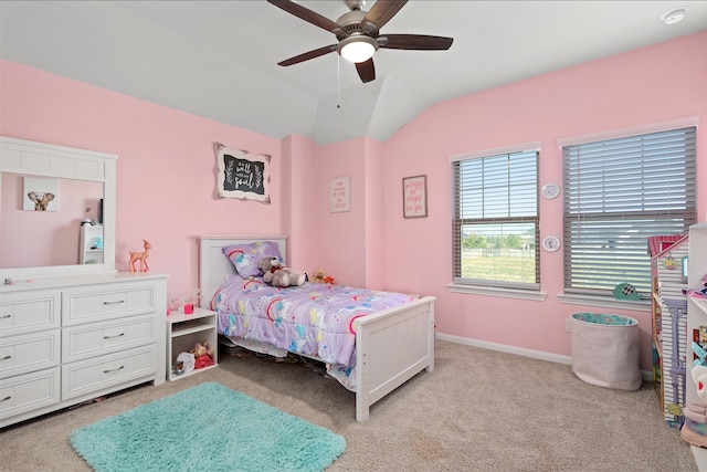 bedroom with light carpet, ceiling fan, and vaulted ceiling