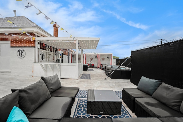 view of patio / terrace with a pergola and an outdoor hangout area