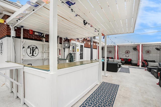 view of patio / terrace featuring an outdoor bar and an outdoor living space