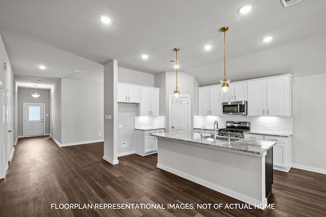 kitchen featuring a center island with sink, stainless steel appliances, white cabinetry, decorative light fixtures, and dark wood-type flooring