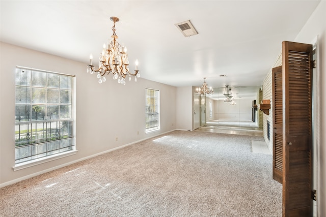 unfurnished living room featuring carpet flooring and a brick fireplace