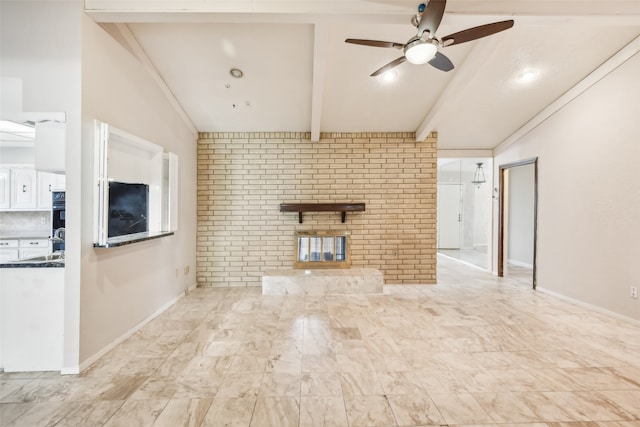 unfurnished living room with vaulted ceiling with beams and ceiling fan