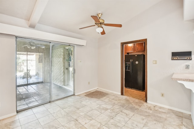 unfurnished room featuring ceiling fan and lofted ceiling