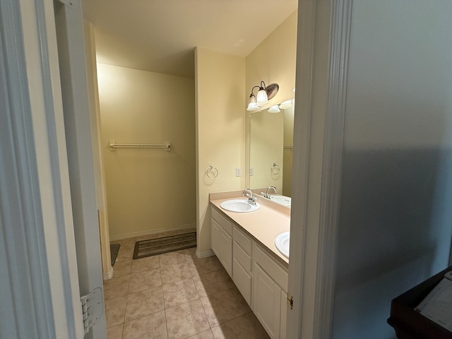 bathroom featuring vanity and tile patterned flooring