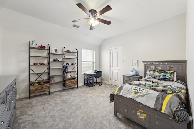 bedroom featuring ceiling fan, lofted ceiling, and light carpet