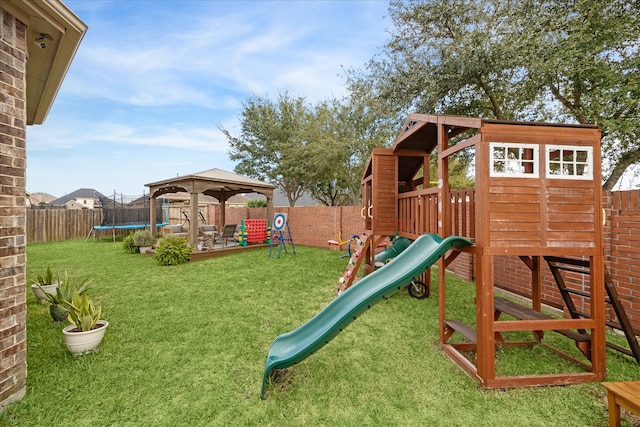 view of jungle gym with a gazebo, a yard, and a trampoline