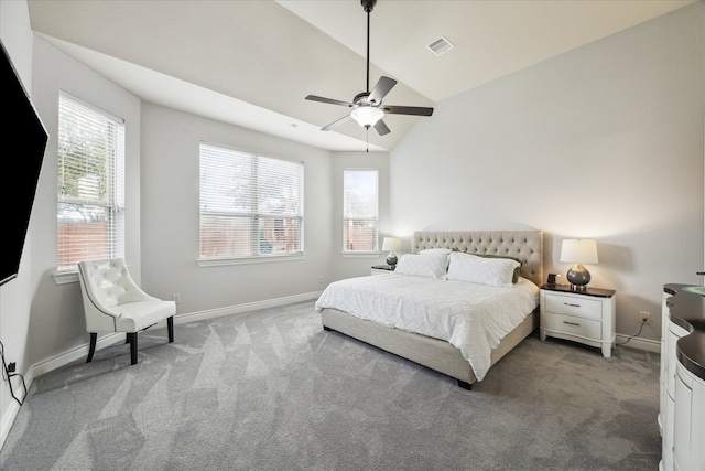 carpeted bedroom featuring ceiling fan and lofted ceiling