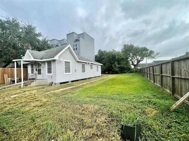 view of property exterior featuring a lawn