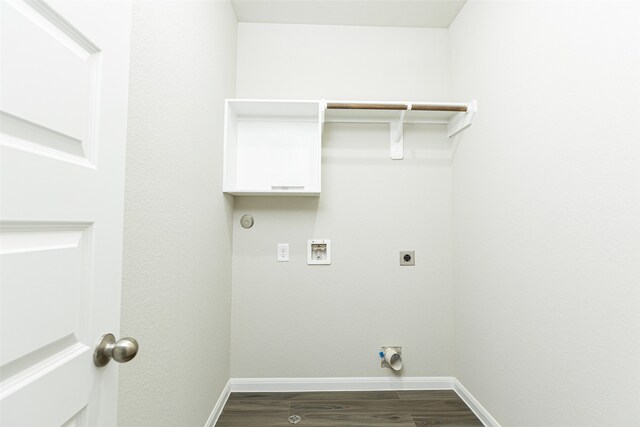 laundry room featuring hookup for an electric dryer, hardwood / wood-style floors, and hookup for a washing machine