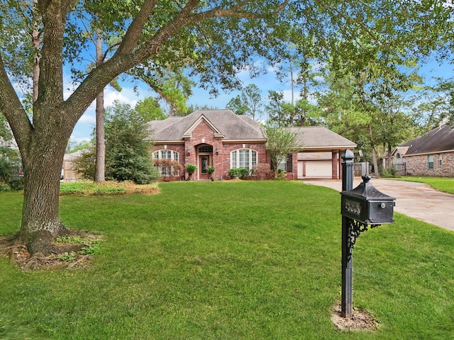 single story home with a garage and a front yard