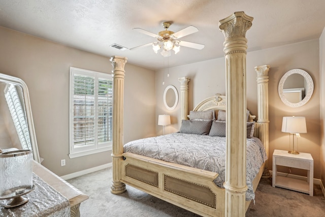 bedroom with ceiling fan and light carpet