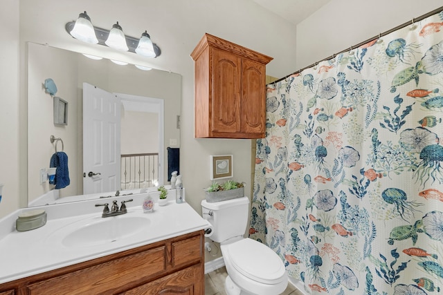 bathroom with a shower with curtain, vanity, and toilet