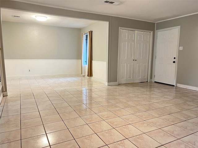 empty room with light tile patterned floors