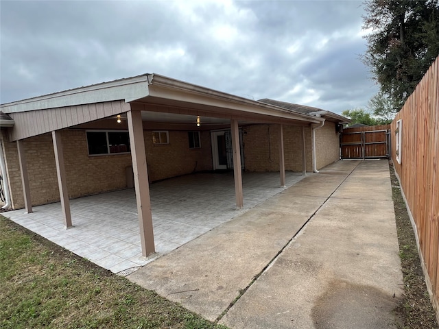 exterior space featuring a carport