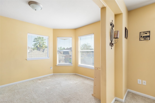 view of carpeted spare room