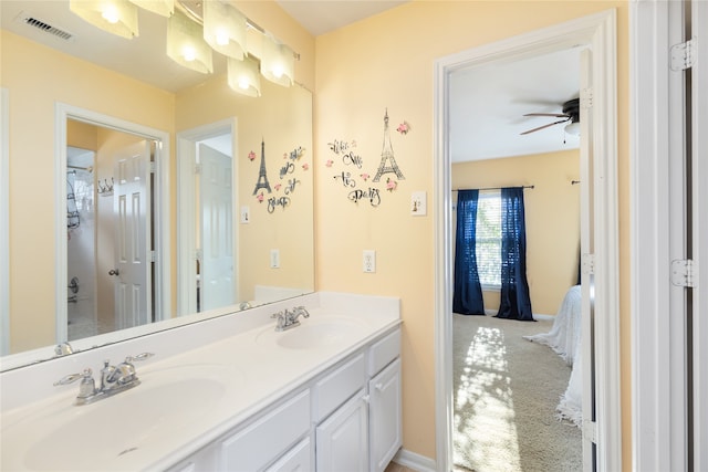 bathroom with vanity and ceiling fan